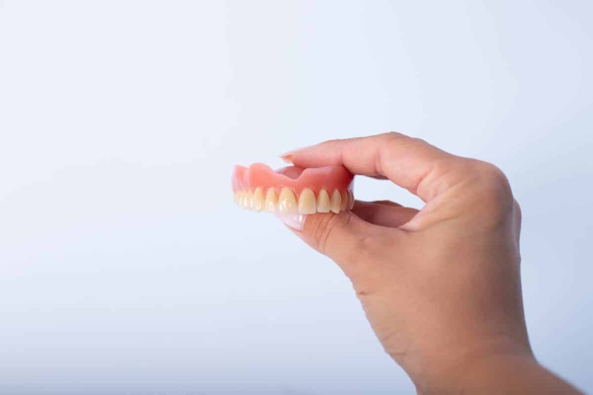 what should i soak my dentures in at night